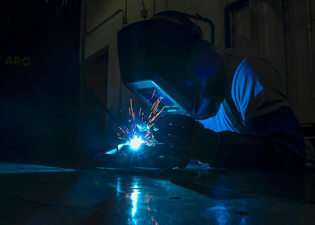 Institutional clients judge the documents before they see the welding — Photo: U.S. Department of Defense (public domain)